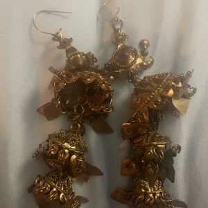 Indian-inspired jhumka dangle earrings with intricate metalwork